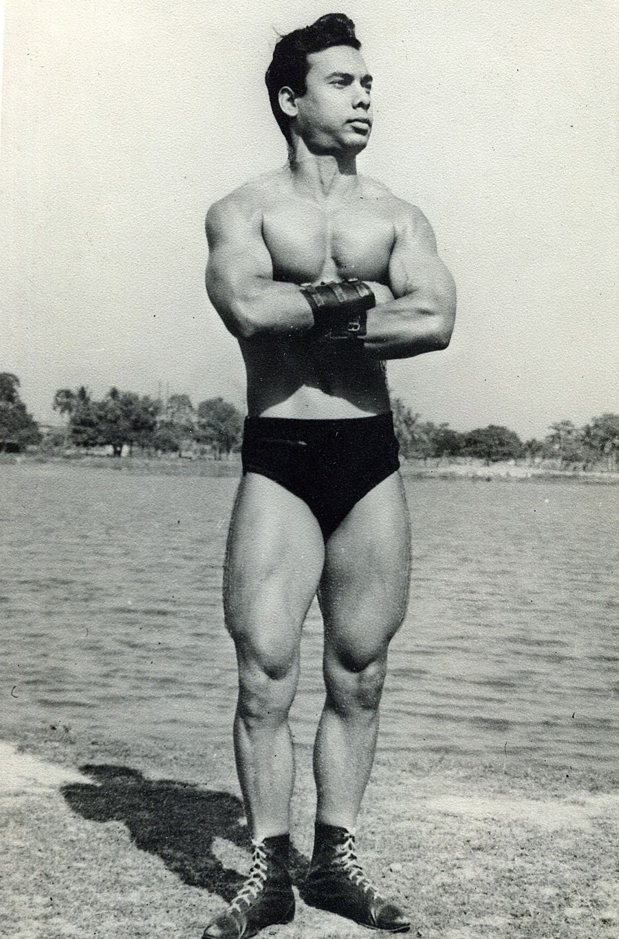 Bikram Choudhury standing at lakeside